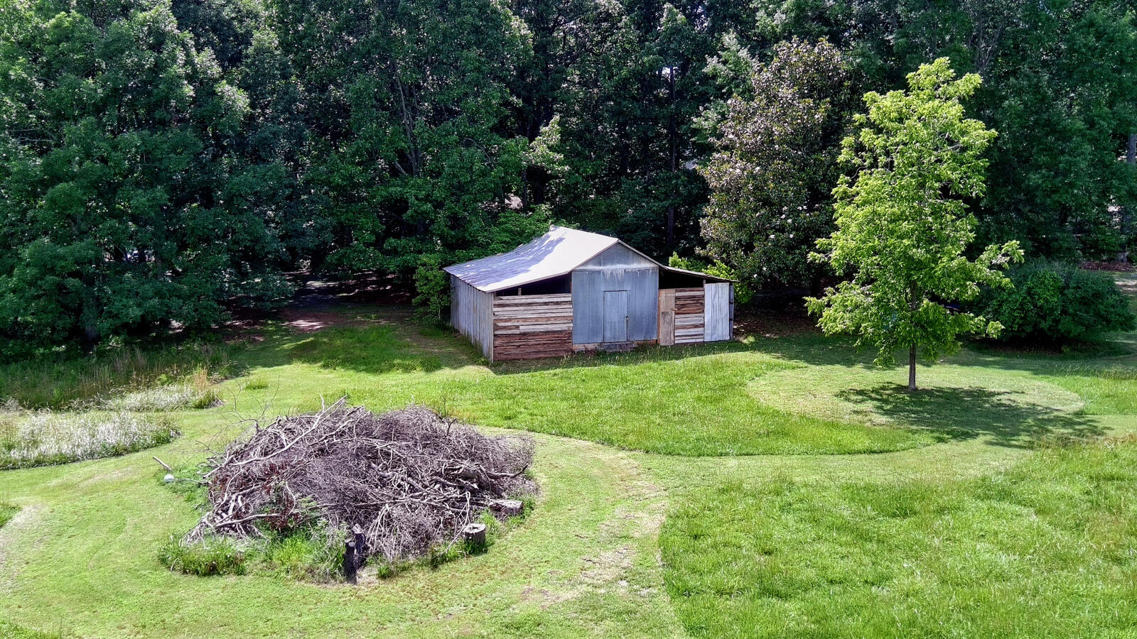 Work in Progress - Corrugated Metal Barn with Paths & Hugelkultur (Hugel Mound)